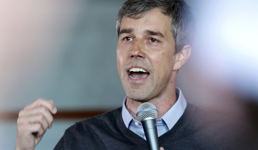Democratic presidential candidate Beto O&#39;Rourke visits Cargo Coffee on East Washington Avenue during a stop in Madison, Wis., Sunday, March 17, 2019. (Amber Arnold/Wisconsin State Journal via AP)