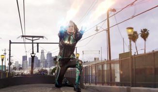 This image released by Disney-Marvel Studios shows Brie Larson in a scene from &amp;quot;Captain Marvel.&amp;quot; (Disney-Marvel Studios via AP)