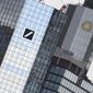 File-Picture taken March 11, 2019 shows the head offices of Deutsche Bank, left, and Commerzbank, right. (Arne Dedert/dpa via AP)