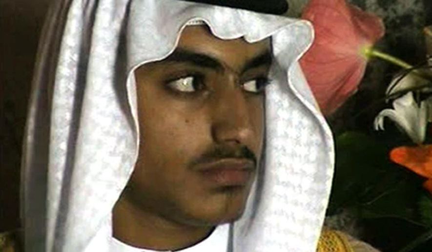 In this image from video released by the CIA on Nov. 1, 2017, Hamza bin Laden is shown at his wedding. Years after the death of his father at the hands of a U.S. Navy SEAL raid in Pakistan, Hamza bin Laden finds himself clearly in the crosshairs of world powers. The U.S. has put up to a $1 million bounty for him. The U.N. Security Council has named him to a global sanctions list, sparking a new Interpol notice for his arrest. His home country of Saudi Arabia has revoked his citizenship. (CIA via AP, File)