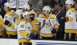 Nashville Predators&#39; Colton Sissons (10) is congratulated after scoring a goal against the San Jose Sharks during the first period of an NHL hockey game Saturday, March 16, 2019, in San Jose, Calif. (AP Photo/Ben Margot)