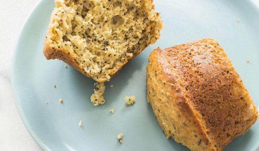 This undated photo provided by America's Test Kitchen in March 2019 shows Anise And Poppy Seed Muffins in Brookline, Mass. This recipe appears in the cookbook "Naturally Sweet." (Carl Tremblay/America's Test Kitchen via AP)