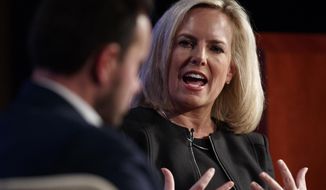 Homeland Security Secretary Kirstjen Nielsen, joined by director of Auburn University&#x27;s McCrary Institute for Cyber and Critical Infrastructure Security, Frank Cilluffo, speaks at George Washington University&#x27;s Jack Morton Auditorium in Washington, Monday, March 18, 2019 (AP Photo/Carolyn Kaster)