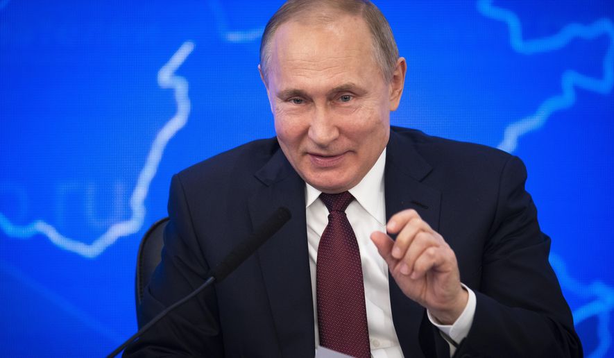 Russian President Vladimir Putin gestures while speakingh at a meeting of the Russian Union of Industrialists and Entrepreneurs in Moscow, Russia, Thursday, March 14, 2019. Putin urged the business community to engage more actively in major infrastructure projects and vowed to create more incentives and help reduce investment risks. (AP Photo/Alexander Zemlianichenko)