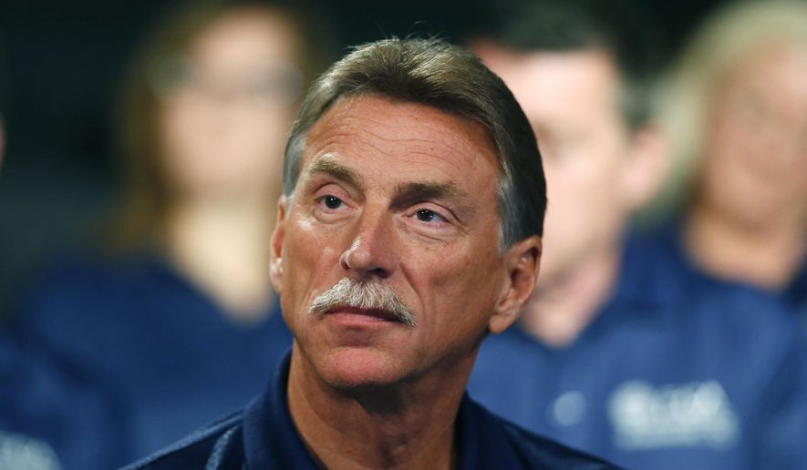 FILE- In a file photo from July 14, 2015, Norwood Jewell, Vice President of the Fiat Chrysler Automobiles US Department, United Auto Workers, during the opening of contract negotiations in Detroit. The former vice president has been charged with conspiracy in a scheme with Fiat Chrysler to buy meals, golf and other perks with money from the automaker. It's the latest development in the government's investigation of how officials at Fiat Chrysler and the UAW enriched themselves by using money set aside for a job-training center. The conspiracy charge against Jewell was filed Monday, March 18, 2019, as a criminal information, which means a guilty plea is likely. (AP Photo/Paul Sancya)