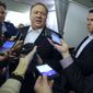 Secretary of State Mike Pompeo, centers, speaks to the media on his plane after departing Kansas City, Missouri, Monday, March 18, 2019. (Jim Young/Pool Image via AP)
