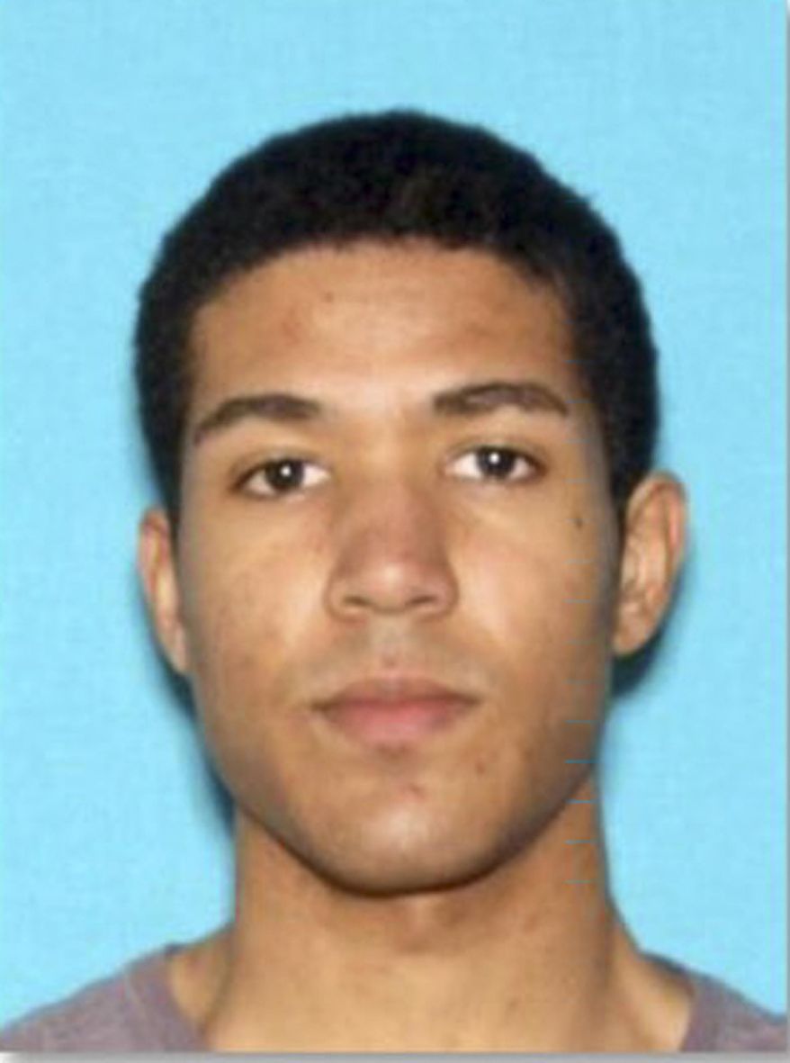 FILE - This undated file booking photo provided by the Los Angeles Police Department show Nicholas K. Oates. Prosecutors on Tuesday, March 19, 2019 charged Oates they say caused a panic at a Los Angeles mall last week. The Los Angeles County District Attorney's Office says Nicholas Oates faces charges including burglary, arson and assault with a firearm. The panic occurred Friday, March 15, when a man entered a store at Westfield Century City mall, took books from shelves and began to ignite them. Police say an employee attempted to stop the man but he pulled a handgun. (Los Angeles Police Department via AP, File)