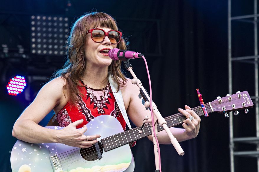 FILE - This July 14, 2018 file photo shows Jenny Lewis performing at the Forecastle Music Festival in Louisville, Ky. Lewis' latest album, "On the Line" will be released on Friday. (Photo by Amy Harris/Invision/AP, File)