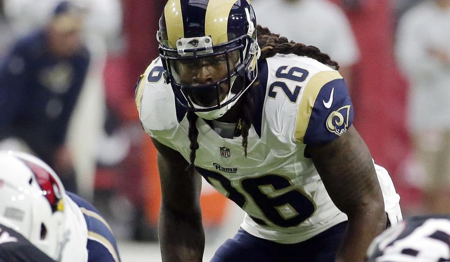 FILE - In this Oct. 2, 2016, file photo, Los Angeles Rams outside linebacker Mark Barron (26) looms over the line of scrimmage during an NFL football game against the Arizona Cardinals in Glendale, Ariz. The Pittsburgh Steelers signed Barron to a two-year deal on Tuesday, March 19, 2019.  (AP Photo/Rick Scuteri, File)