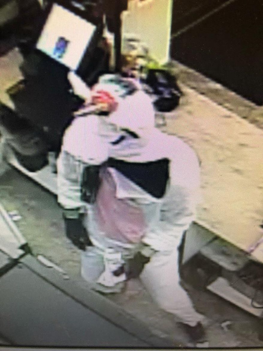 This photo provided by Baltimore County police shows surveillance video of an armed robbery with a suspect dressed in the unicorn costume. Baltimore County police have captured Jacob William Rogge, suspected of robbing a convenience store on Saturday, March 17, 2019 dressed in a unicorn costume. Rogge donned a pink-and-white unicorn costume and smashed a High's Dairy Store register with a crowbar. Police say 27-year-old Joseph Philip Svezzese drove Rogge, who fled with cash and cigarettes.(Baltimore County police via AP)