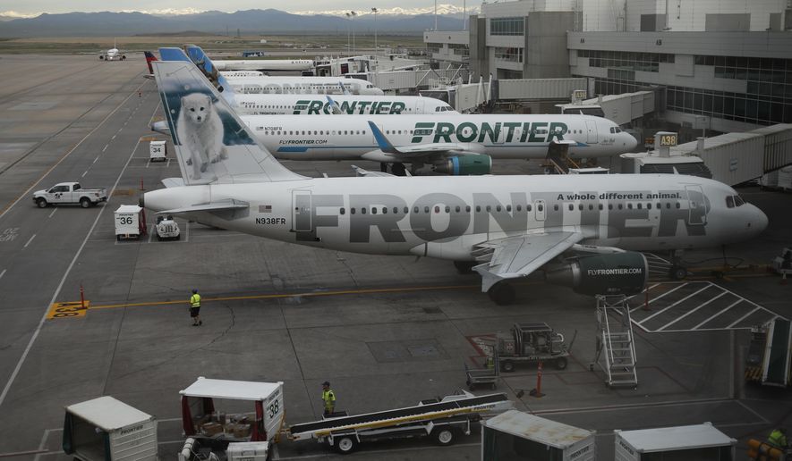 FILE - In this May 15, 2017 file photo, Frontier Airlines jetliners sit at gates at Denver International Airport. The union representing Frontier Airlines flight attendants says they have reached a tentative contract deal with the Denver-based budget carrier. The Association of Flight Attendants-CWA said both sides agreed to terms for the contract Tuesday, March 19, 2019,  but the language still needs to be finalized and approved by the flight attendants&#x27; elected union leaders. The union says the deal includes significant pay increases, schedule flexibility, quality of life enhancements and other benefits.  (AP Photo/David Zalubowski, File)