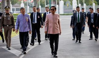 In this Tuesday, March 5, 2019, Thai Prime Minister Prayuth Chan-ocha arrives at the Government House before a cabinet meeting in Bangkok, Thailand. Prayuth became prime minister in a very Thai way: He led a military coup. Now after five years of running Thailand with absolute power, he&#39;s seeking to hold on to the top job through the ballot box. (AP Photo/Sakchai Lalit)