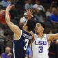 Yale &#39;s Alex Copeland, left, and LSU&#39;s Tremont Waters go after a loose ball during the first half of a first round men&#39;s college basketball game in the NCAA Tournament, in Jacksonville, Fla. Thursday, March 21, 2019. (AP Photo/Stephen B. Morton)