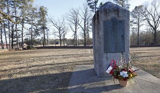 File-This March 5, 2019, file photo shows a memorial marker standing in the University of Mississippi campus cemetery that has the graves of Confederate soldiers killed at the Battle of Shiloh.  The University of Mississippi&#39;s leader says he agrees that a Confederate monument should be shifted from its current spot on campus. Interim Chancellor Larry Sparks said in a Thursday, March 21, 2019, statement that he is consulting with historic preservation officials on relocating the statue. (AP Photo/Rogelio V. Solis, File)