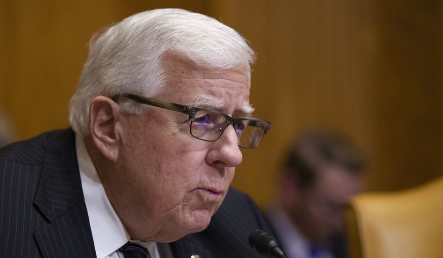Chairman Mike Enzi, R-Wyo., speaks during a hearing of the Senate Budget Committee on the &quot;Budget and Economic Outlook for FY2019-2029,&quot; on Capitol Hill, Tuesday, Jan. 29, 2019, in Washington. (AP Photo/Alex Brandon)
