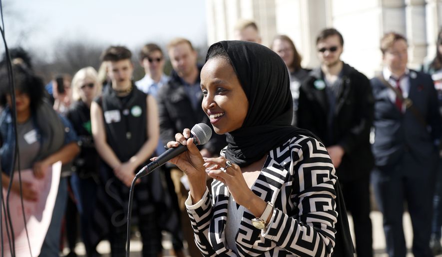 In this file photo, U.S. Rep Ilhan Omar, D-Minn., speaks to a rally of high school students from across the state of Minnesota outside the State Capitol steps in St. Paul on Thursday, March 21, 2019. (AP Photo/Jim Mone) ** FILE **