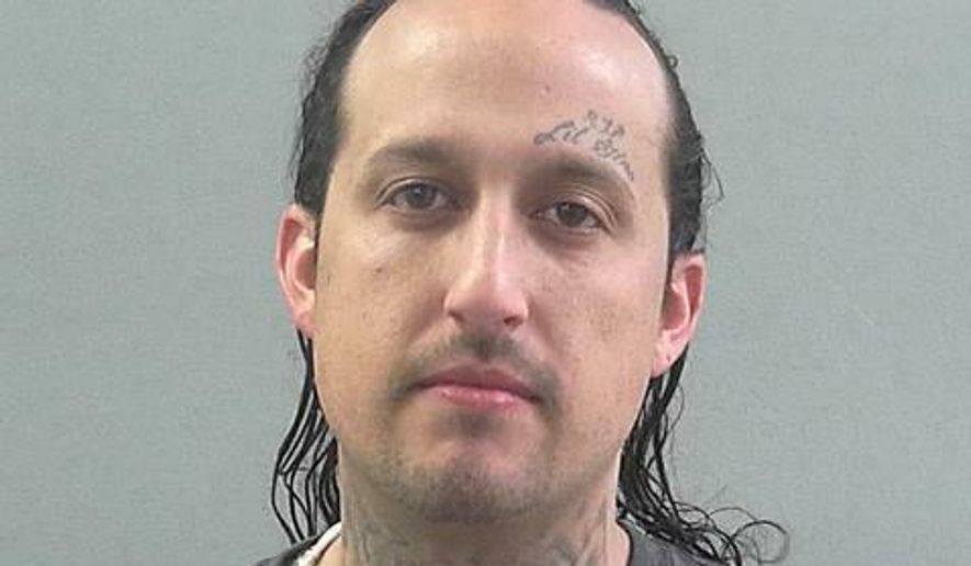 This undated photo provided by Weber County, Utah, shows Cody Tripp. Authorities say Tripp is the main suspect in the killing of 29-year-old Jordan Vigil, who was found dead in Tripp's Castro Valley, California, home on May 14, 2012. Tripp was booked Wednesday, March 20, 2019 in the Weber County Jail in Ogden, Utah, and is being held without bail. (Weber County, Utah via AP)
