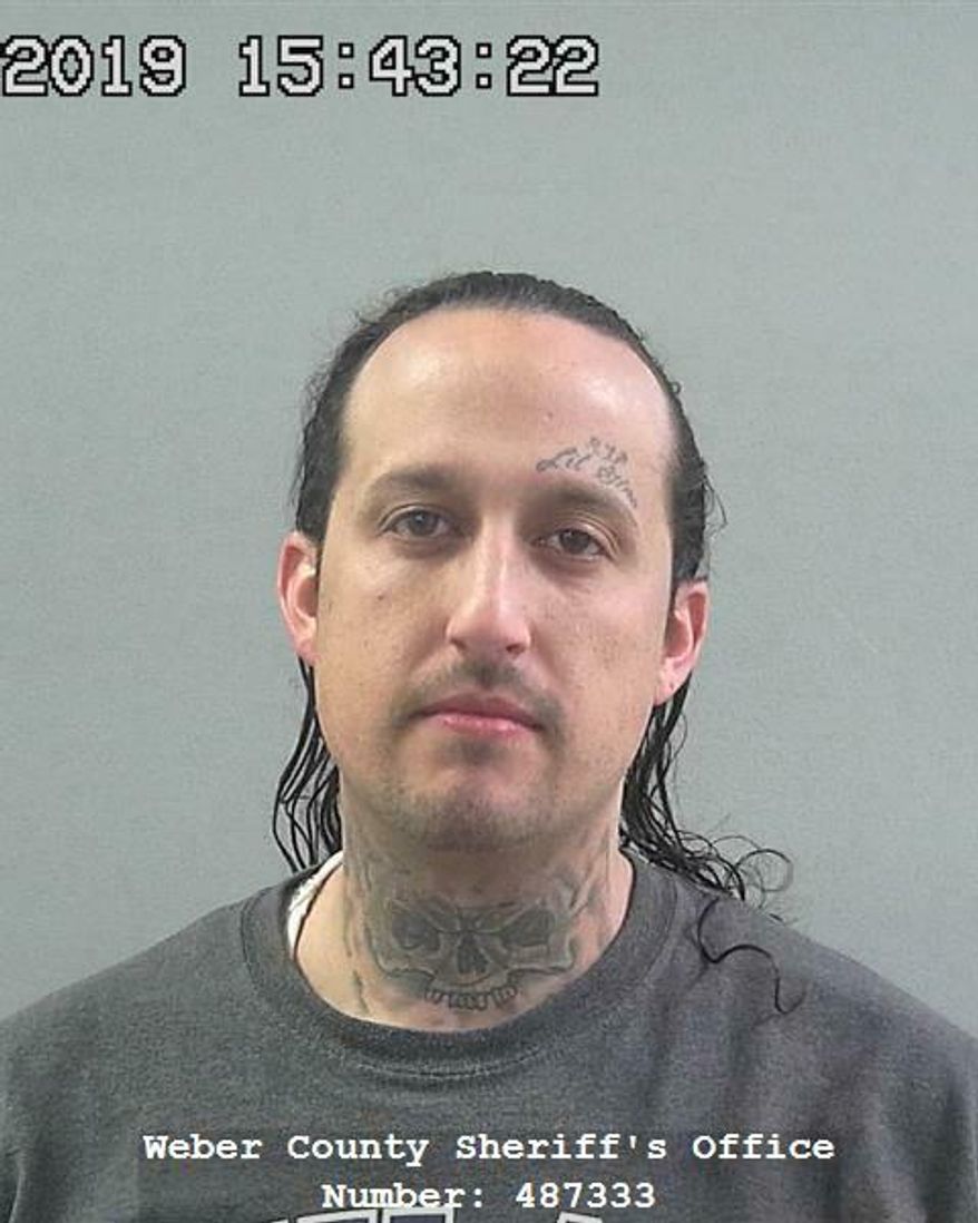 This undated photo provided by Weber County, Utah, shows Cody Tripp. Authorities say Tripp is the main suspect in the killing of 29-year-old Jordan Vigil, who was found dead in Tripp's Castro Valley, California, home on May 14, 2012. Tripp was booked Wednesday, March 20, 2019 in the Weber County Jail in Ogden, Utah, and is being held without bail. (Weber County, Utah via AP)