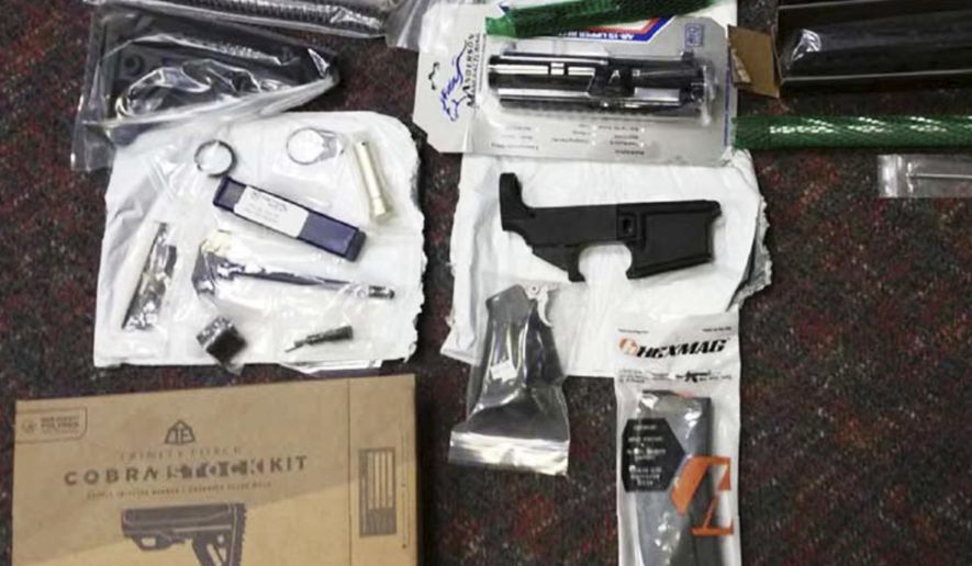 This undated photo provided by the Office of Attorney General of New Jersey shows parts of guns confiscated after being sold by mail order from a California company. New Jersey's attorney general announced a lawsuit Friday, March 22, 2019, against the California company that sells mail-order firearms parts that can be turned into working weapons, the first such action the state has taken since it banned so-called "ghost guns" last year. (Office of Attorney General of New Jersey via AP)