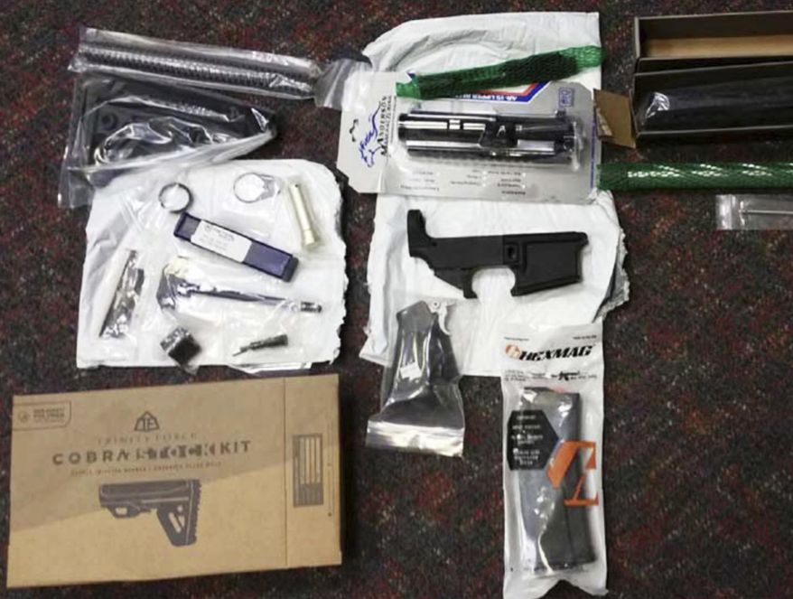 This undated photo provided by the Office of Attorney General of New Jersey shows parts of guns confiscated after being sold by mail order from a California company. New Jersey's attorney general announced a lawsuit Friday, March 22, 2019, against the California company that sells mail-order firearms parts that can be turned into working weapons, the first such action the state has taken since it banned so-called "ghost guns" last year. (Office of Attorney General of New Jersey via AP)