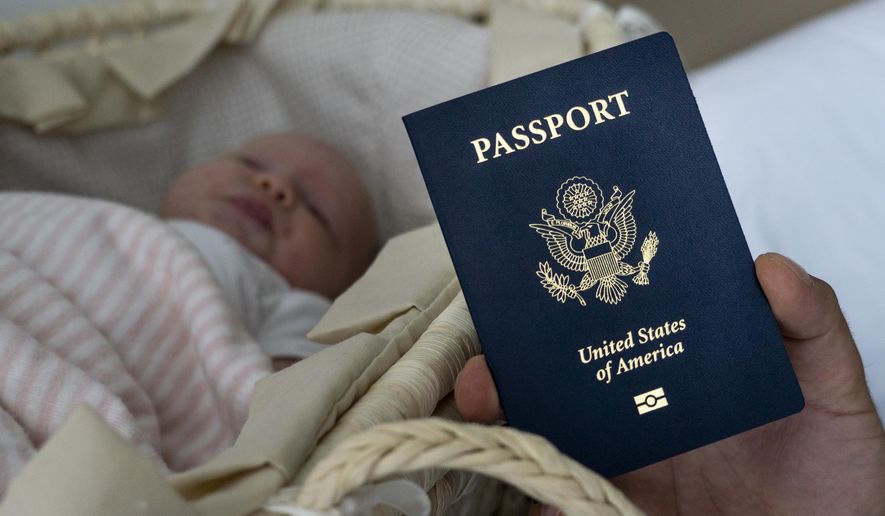 In this photo taken on Jan. 24, 2019, Denis Wolok, the father of 1-month-old Eva&#x27;s father, shows the child&#x27;s U.S. passport during an interview with The Associated Press in Hollywood, Fla. Every year, hundreds of pregnant Russian women, like Wolok&#x27;s wife, Olga Zemlyanaya, travel to the United States to give birth so that their child can acquire all the privileges of American citizenship. (AP Photo/Iuliia Stashevska)
