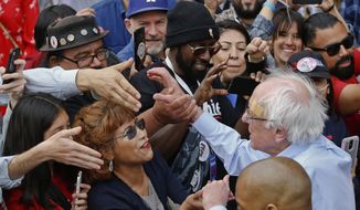 Democratic presidential candidate Sen. Bernie Sanders, I-Vt., greets supporters at a rally at Grand Park in Los Angeles, Saturday, March 23, 2019. The Vermont senator made a notable, second-place finish in California&#39;s 2016 presidential primary when he won 27 of 58 counties. (AP Photo/Damian Dovarganes)