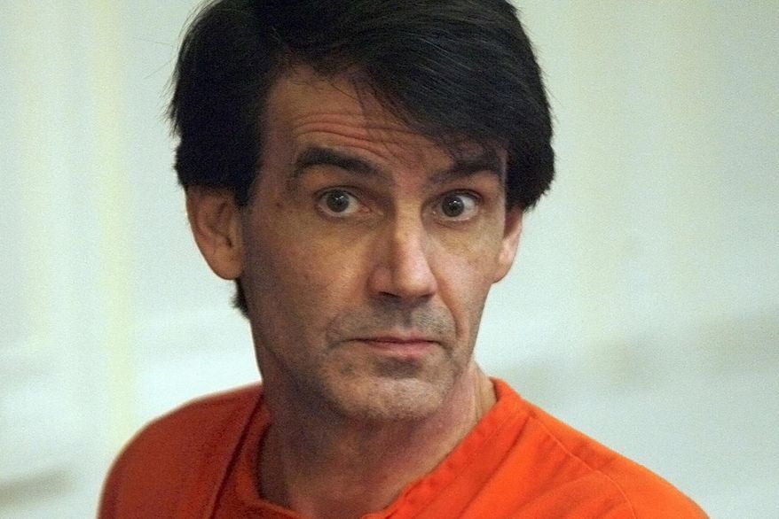 FILE--In this Oct. 2011, file photo, James Kraig Kahler listens to the judge while being sentenced in Osage County Court in Lyndon, Kansas. The U.S. Supreme Court has agreed to consider a Kansas death penalty case that could have implications for mentally ill defendants across the nation. The case involves Kahler, convicted and sentenced to death for the 2009 fatal shootings of his estranged wife, her grandmother and his two teenage daughters. His attorneys argue that he was suffering from depression so severe that he experienced extreme emotional disturbance, dissociating him from reality. (Anthony S. Bush/The Topeka Capital Journal via AP, Pool, File)
