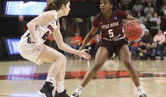 Little Rock&#39;s Tori Lasker (5) tries to get past Gonzaga&#39;s Katie Campbell (24) during the first half of a first-round game of the NCAA women&#39;s college basketball tournament in Corvallis, Ore., Saturday, March 23, 2019. (AP Photo/Amanda Loman)