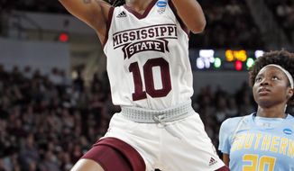 Mississippi State guard Jazzmun Holmes (10) drives past Southern guard Li&#39;Neshon Legard (20) to make a layup during the second half of a first-round game in the NCAA women’s college basketball tournament in Starkville, Miss., Friday, March 22, 2019. Mississippi State won 103-46. (AP Photo/Rogelio V. Solis)