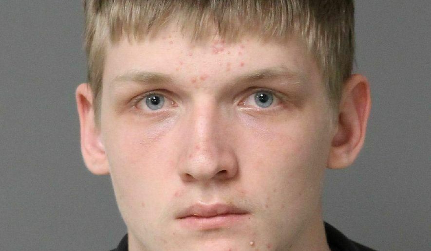 This undated photo provided by Wake City-County Bureau of Identification shows Jonathan Kyle Courtney, 18, who's accused of opening fire with two pellet guns in a bookstore in Cary, N.C., on Friday March 22, 2019, and causing minor injuries to two people. Cary town officials said in a news release that Courtney has been charged with two counts of felony assault with a deadly weapon and one count of discharging a barreled weapon into an occupied property. (Wake City-County Bureau of Identification via AP)