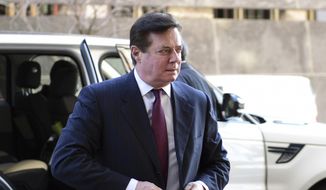 In this Dec. 11, 2017, file photo, former Trump campaign chairman Paul Manafort arrives at federal court in Washington. (AP Photo/Susan Walsh, File)