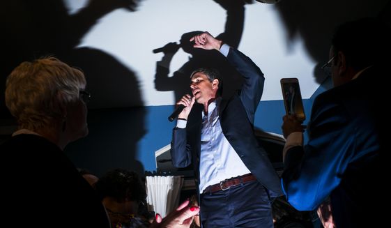 Democratic presidential candidate and former Texas congressman Beto O&#x27;Rourke addresses a gathering during a campaign stop at a home in Las Vegas on Saturday, March 23, 2019. (Chase Stevens/Las Vegas Review-Journal via AP)