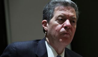 While serving as Kansas governor, Sam Brownback once signed legislation largely condemned by Muslim groups. (Associated Press)