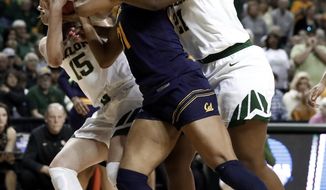 Baylor&#x27;s Lauren Cox (15) and Kalani Brown, right, combine to strip the ball away from California center Kristine Anigwe (31) in the first half of a second-round game in the NCAA women&#x27;s college basketball tournament in Waco, Texas, Monday, March 25, 2019. (AP Photo/Tony Gutierrez)