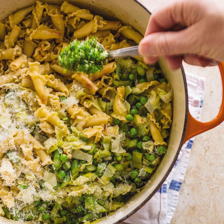 This undated photo provided by America's Test Kitchen in March 2019 shows Spring Vegetable Pasta in Brookline, Mass. This recipe appears in the cookbook "Revolutionary Recipes." (Carl Tremblay/America's Test Kitchen via AP)