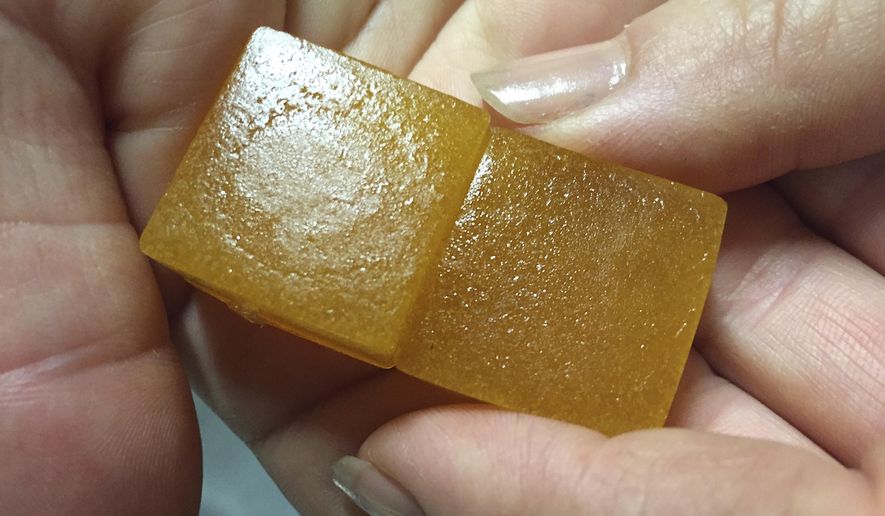 This Thursday, June 2, 2016 file photo shows lime-flavored cannabis-infused gummy candy in Portland, Ore., on the first day recreational marijuana users could legally purchase marijuana edibles and oils in the state. (AP Photos/Gillian Flaccus) **FILE**