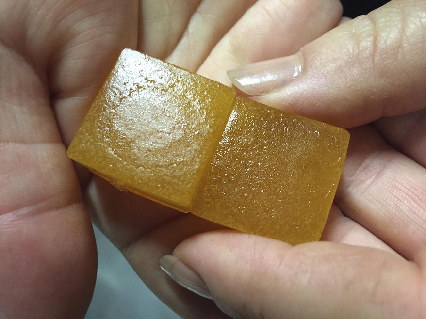 This Thursday, June 2, 2016 file photo shows lime-flavored cannabis-infused gummy candy in Portland, Ore., on the first day recreational marijuana users could legally purchase marijuana edibles and oils in the state. (AP Photos/Gillian Flaccus) **FILE**
