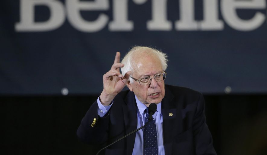 In this March 10, 2019, file photo, Democratic presidential candidate Sen. Bernie Sanders, I-Vt., addresses a rally during a campaign stop in Concord, N.H. “Medicare for All” legislation has two provisions that could make it even more politically divisive for 2020 Democratic presidential candidates: It lifts curbs on government health insurance for people in the country illegally and revokes longstanding restrictions on taxpayer-funded abortions. Embracing these will give Democratic candidates a boost with the party’s liberal base in the primaries. But that could complicate things for an eventual nominee seeking support from voters in the middle (AP Photo/Steven Senne, File)
