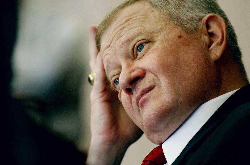 Author Tom Clancy fields questions at the Norfolk Naval Base in Norfolk, Va. Clancy’s widow has expanded her challenge to the ownership of the novelist’s famous character Jack Ryan (Stephen M. Katz/The Virginian-Pilot via AP, File)