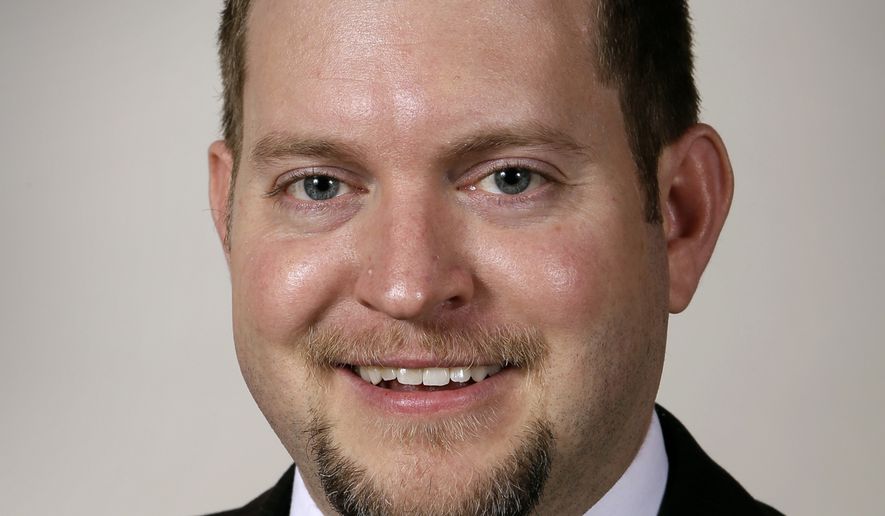 Iowa state Sen. Jake Chapman amended the bill Tuesday on the floor of the Senate to make causing the death of a fetus a life-in-prison crime, the same as someone convicted of murder. Language equates such deaths to "killing an unborn person." (Associated Press)