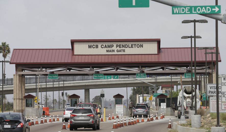The entrance to Marine Corps base Camp Pendleton is seen Tuesday, Sept. 22, 2015, in Oceanside, Calif. (AP Photo/Gregory Bull) ** FILE **