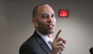 Rep. Hakeem Jeffries, D-N.Y., the House Democratic Caucus chair, fends off reporters&#39; questions about President Donald Trump and the Mueller report, at the Capitol in Washington, Monday, March 25, 2019. (AP Photo/J. Scott Applewhite) ** FILE **
