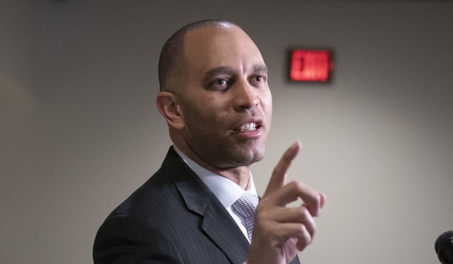 Rep. Hakeem Jeffries, D-N.Y., the House Democratic Caucus chair, fends off reporters&#x27; questions about President Donald Trump and the Mueller report, at the Capitol in Washington, Monday, March 25, 2019. (AP Photo/J. Scott Applewhite) ** FILE **