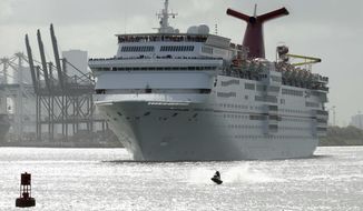 In this June 20, 2016, file photo, a jet skier passes in front of the Carnival Sensation cruise ship as it leaves PortMiami, in Miami Beach, Fla. (AP Photo/Lynne Sladky, File) **FILE**