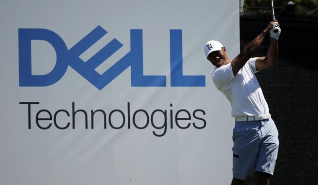Tiger Woods hits from the 15th tee during a practice round at the Dell Match Play Championship golf tournament, Tuesday, March 26, 2019, in Austin, Texas. (AP Photo/Eric Gay)