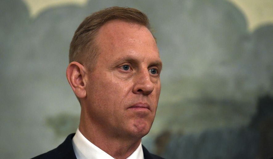 Acting Defense Secretary Patrick Shanahan listens during a proclamation signing with President Donald Trump and Israeli Prime Minister Benjamin Netanyahu in the Diplomatic Reception Room at the White House in Washington, Monday, March 25, 2019. Top defense leaders will face worried lawmakers on Capitol Hill for the first time since the Pentagon listed military construction projects that could lose funding this year to pay for President Donald Trump’s border wall.  (AP Photo/Susan Walsh)
