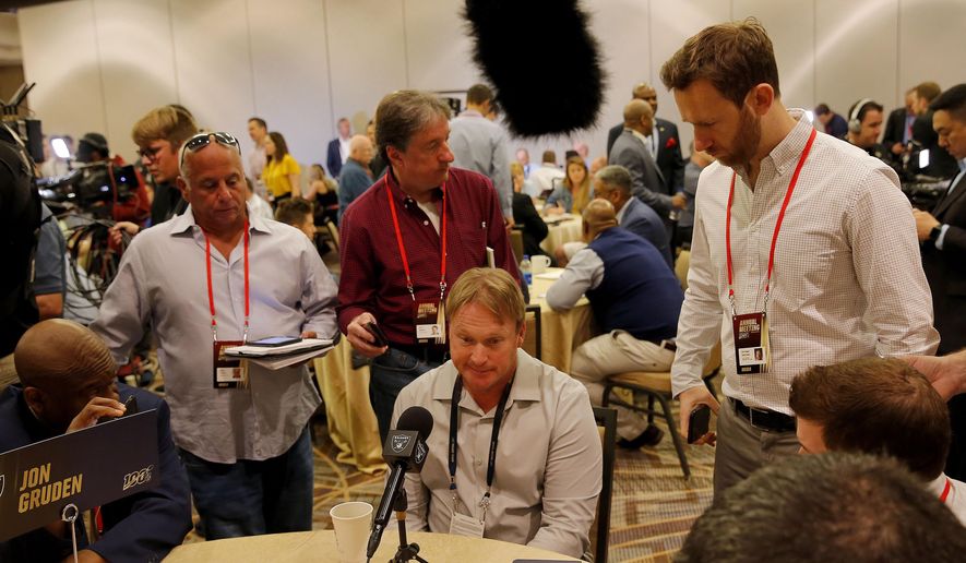 Oakland Raiders head coach Jon Gruden speaks to the media during the NFC/AFC coaches breakfast during the annual NFL football owners meetings, Tuesday, March 26, 2019, in Phoenix. (AP Photo/Matt York)