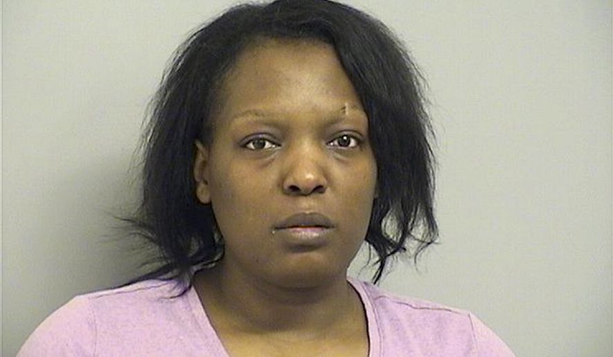 In this Tuesday, March 26, 2019, booking provided by the Tulsa County Sheriff's Department, shows 25-year-old Deionna Young who is being held without bond Tuesday on a first-degree murder charge in Tulsa. Police say Young, an Oklahoma restaurant manager, has been charged with killing an abusive customer, Desean Tallent, after reporting he threatened her, left and then returned. Police say Tallent later returned, but drove off. Young followed and allegedly shot him, then returned to work. (Tulsa County Sheriff's Department via AP)