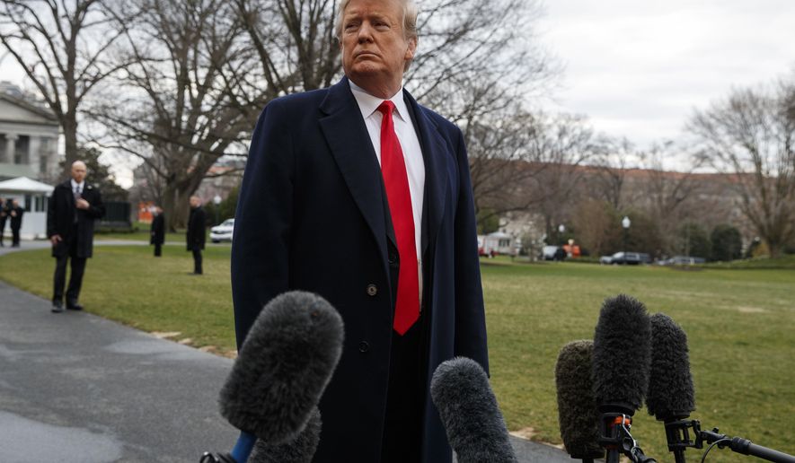 President Donald Trump listens to a question as he speaks with reporters before boarding Marine One on the South Lawn of the White House, Friday, March 22, 2019, in Washington. (AP Photo/Evan Vucci) **FILE**