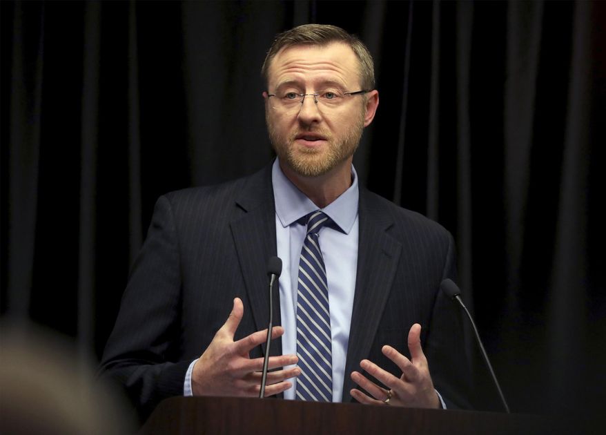 FILE - In this March 15, 2019 file photo, Wisconsin Supreme Court candidate Brian Hagedorn speaks during a debate with opponent Lisa Neubauer at the Wisconsin State Bar Center in Madison, Wis. A Republican group announced Tuesday, March 26, 2019 it is launching a seven-figure ad buy a week before the April 2 election to boost candidate Hagedorn in his race against Lisa Neubauer. The Republican State Leadership Committee's Judicial Fairness Initiative said it was spending at least $1 million on the effort, which would be the most significant outside spending for Hagedorn so far. (John Hart/Wisconsin State Journal via AP, File)